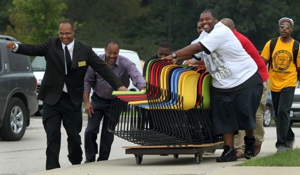 Thousands overflow service for Brown family